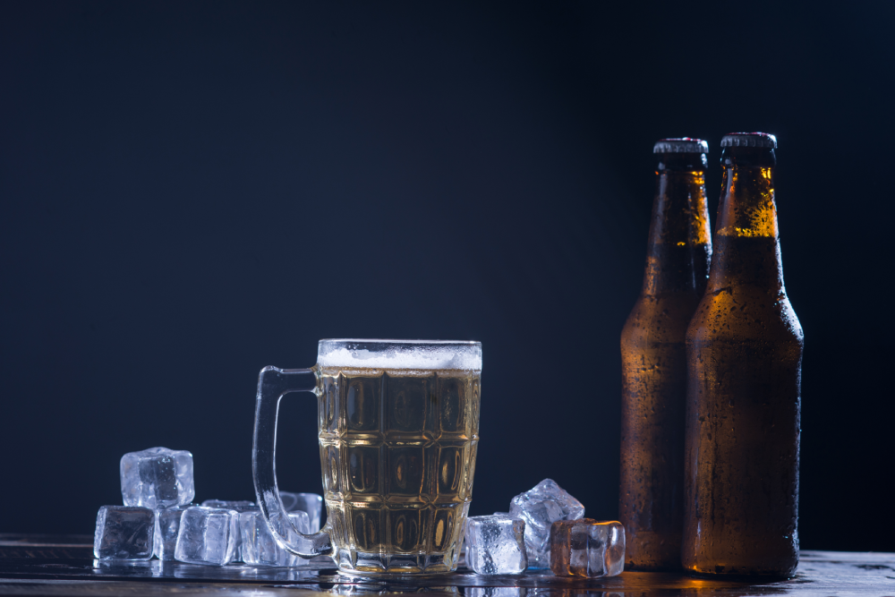 glass-bottles-beer-with-glass-ice-dark-background